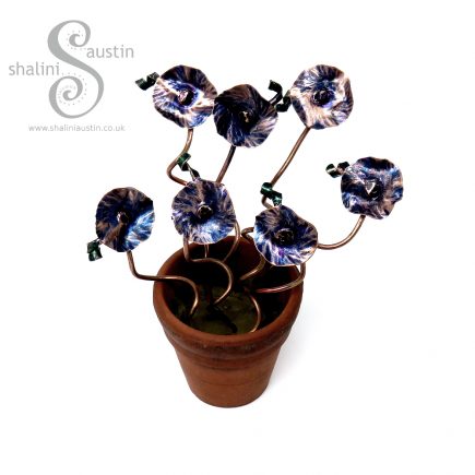 Blue Miniature Copper Flowers in a Pot