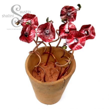 Cute Red Miniature Copper Flowers in a Pot